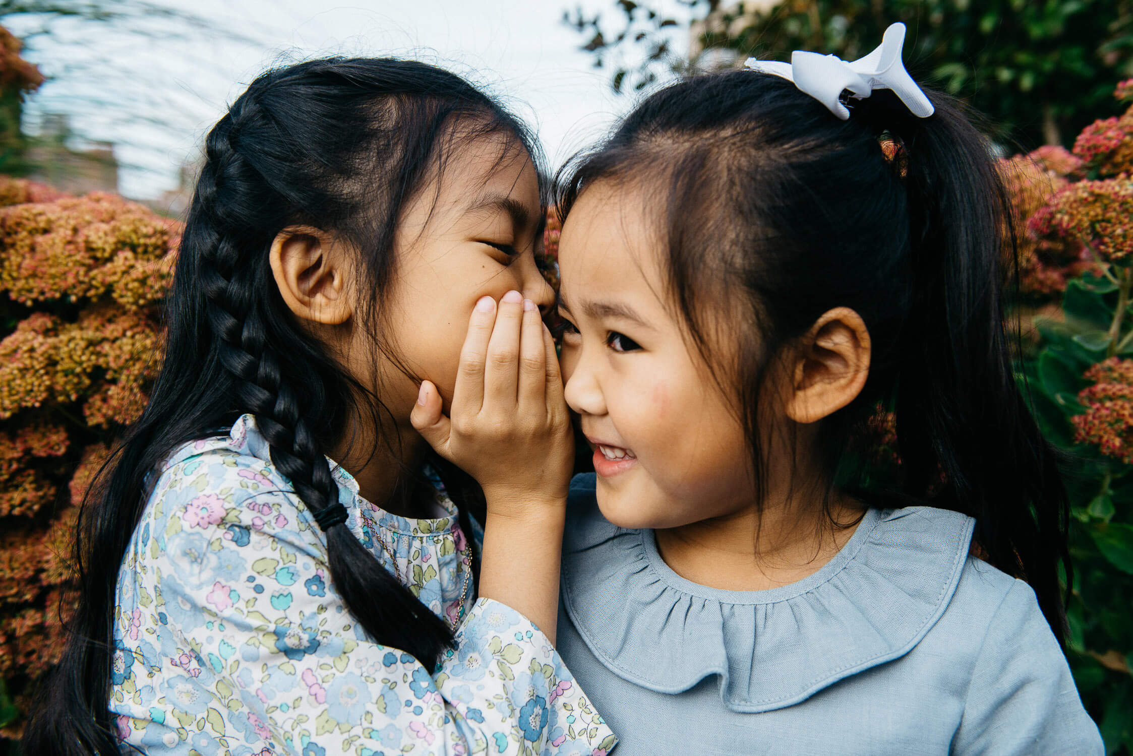 girl sitting on vintage bus seat with warm sunlight, nostalgic kids portrait