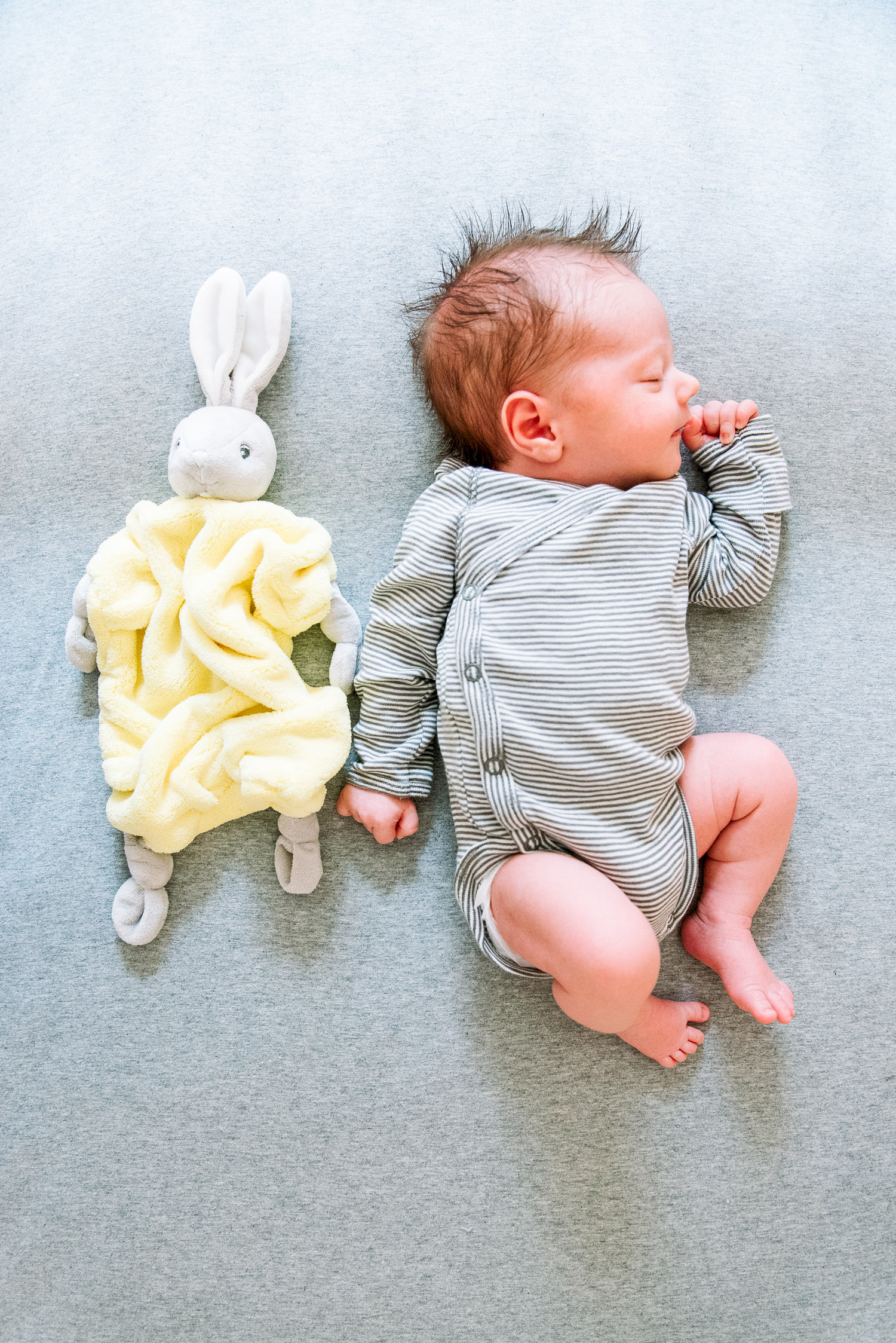 Peaceful sleeping newborn baby photographed during in-home session in Manhattan apartment